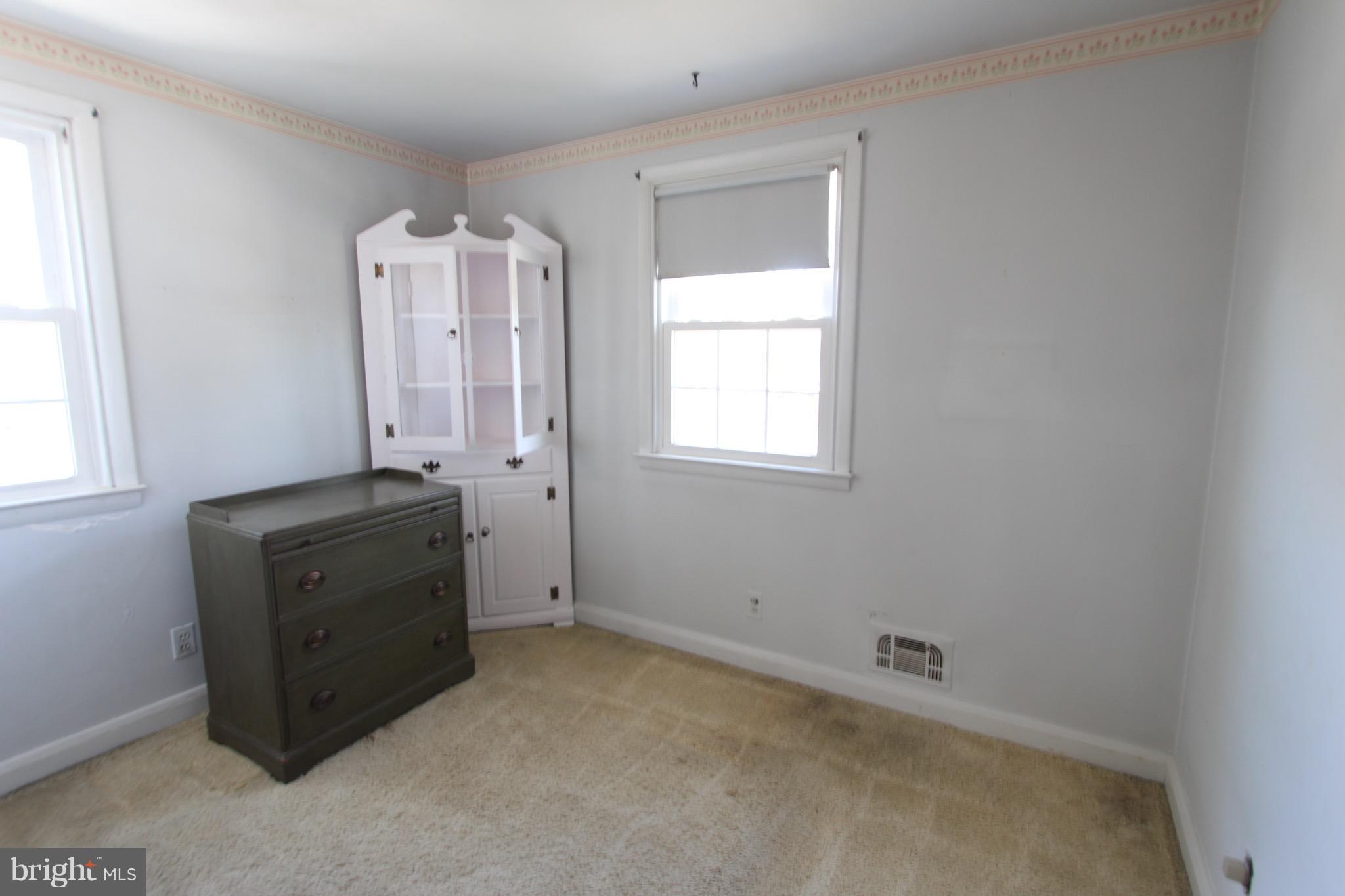 1202 Longford Road Lutherville-Timonium, MD 21093 - Photo 14 of 20 an empty room with a window