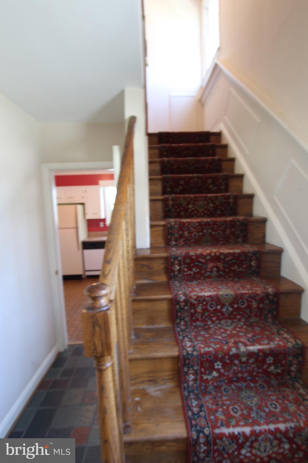 1202 Longford Road Lutherville-Timonium, MD 21093 - Photo 15 of 20 a view of entryway and hall with wooden floor