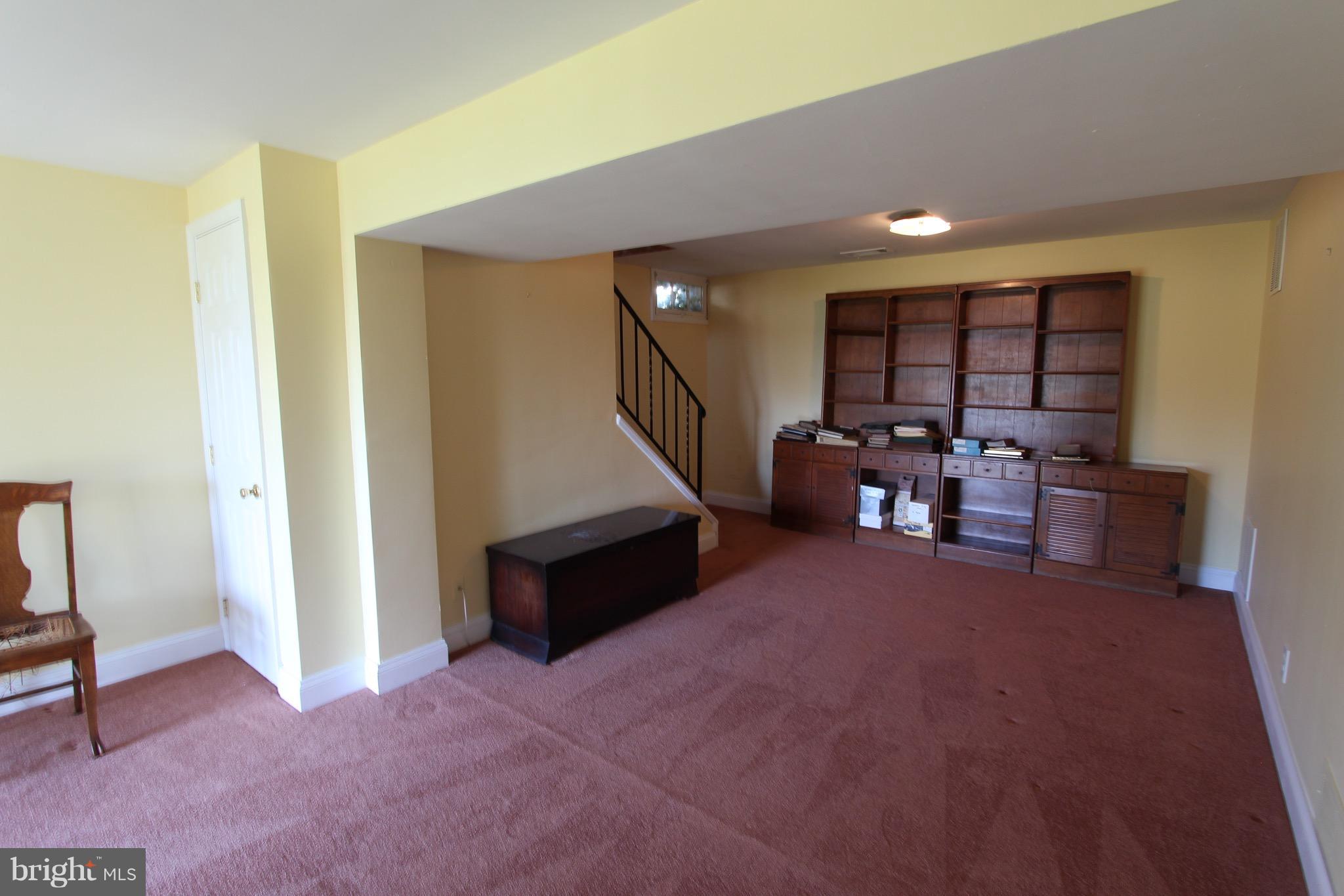 1202 Longford Road Lutherville-Timonium, MD 21093 - Photo 17 of 20 a living room with furniture and a window