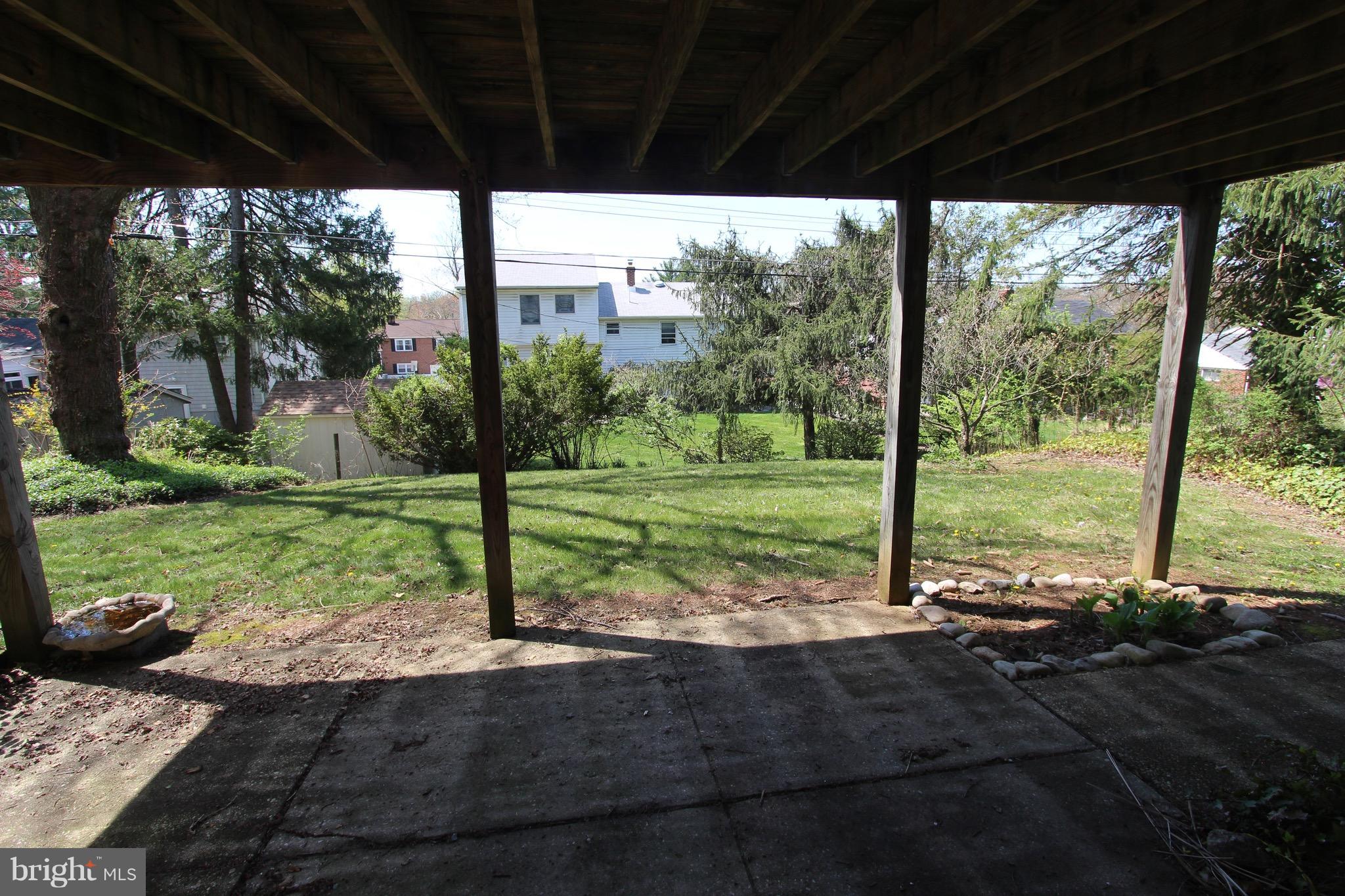 1202 Longford Road Lutherville-Timonium, MD 21093 - Photo 20 of 20 a view of a porch with a big yard