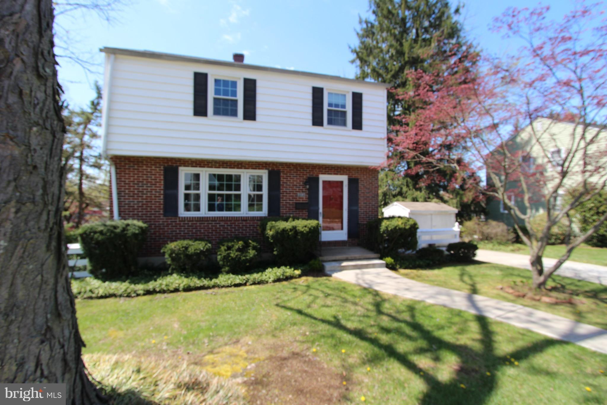 1202 Longford Road Lutherville-Timonium, MD 21093 - Photo 3 of 20 a view of a house with pool and garden