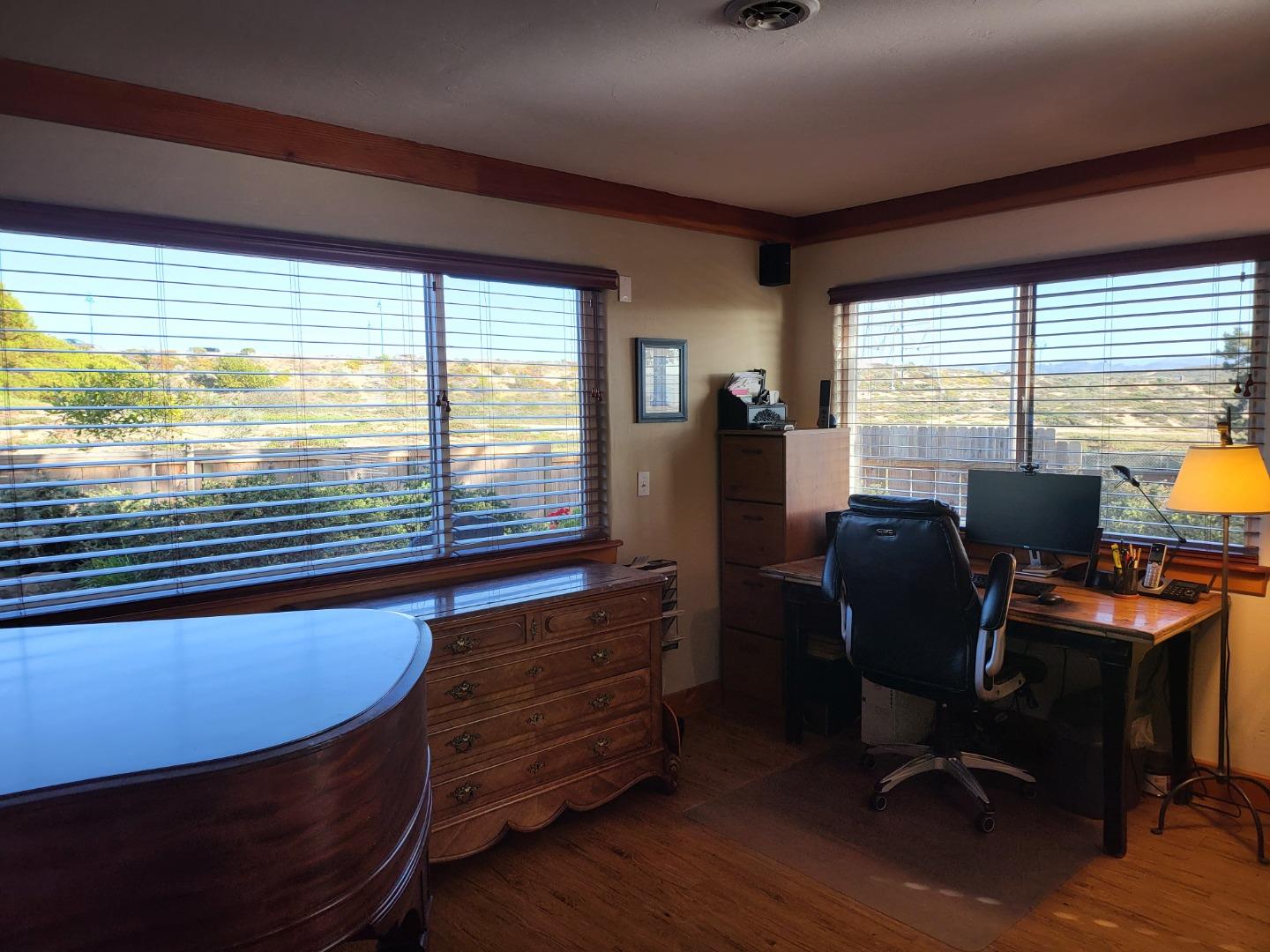 1753 Juarez Street Seaside, CA 93955 - Photo 12 of 52 a view of a workspace with furniture and a window