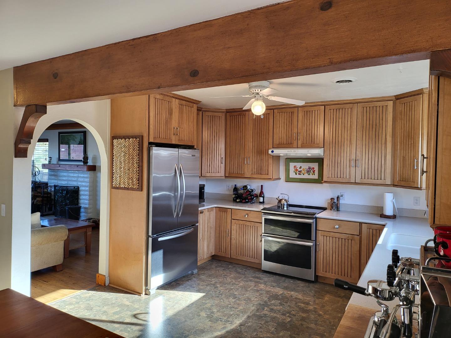 1753 Juarez Street Seaside, CA 93955 - Photo 15 of 52 a kitchen with a sink a refrigerator and cabinets
