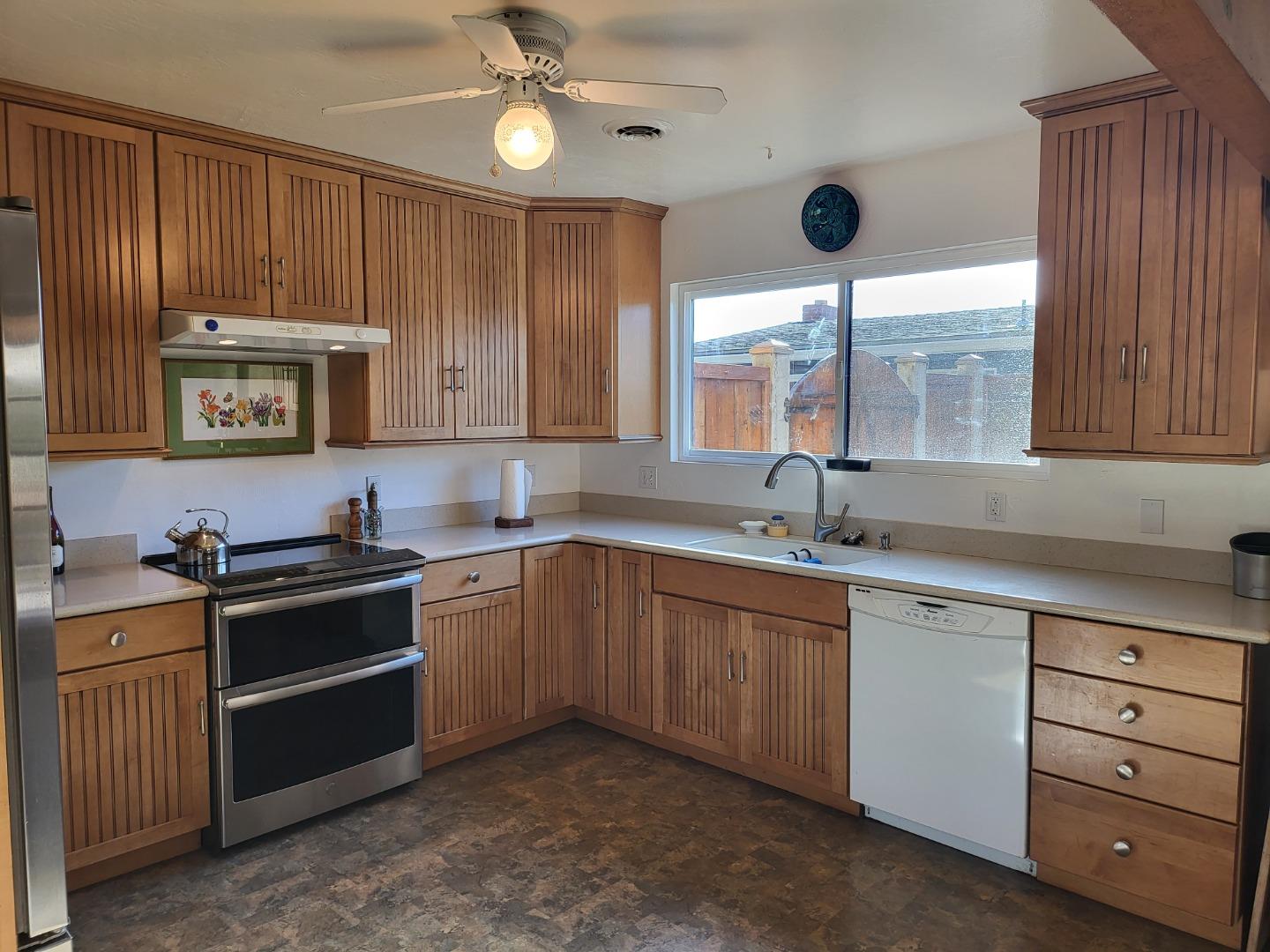 1753 Juarez Street Seaside, CA 93955 - Photo 16 of 52 a kitchen with sink cabinets and window