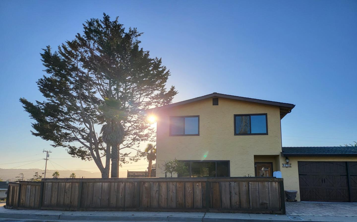 1753 Juarez Street Seaside, CA 93955 - Photo 2 of 52 a front view of a house with a tree