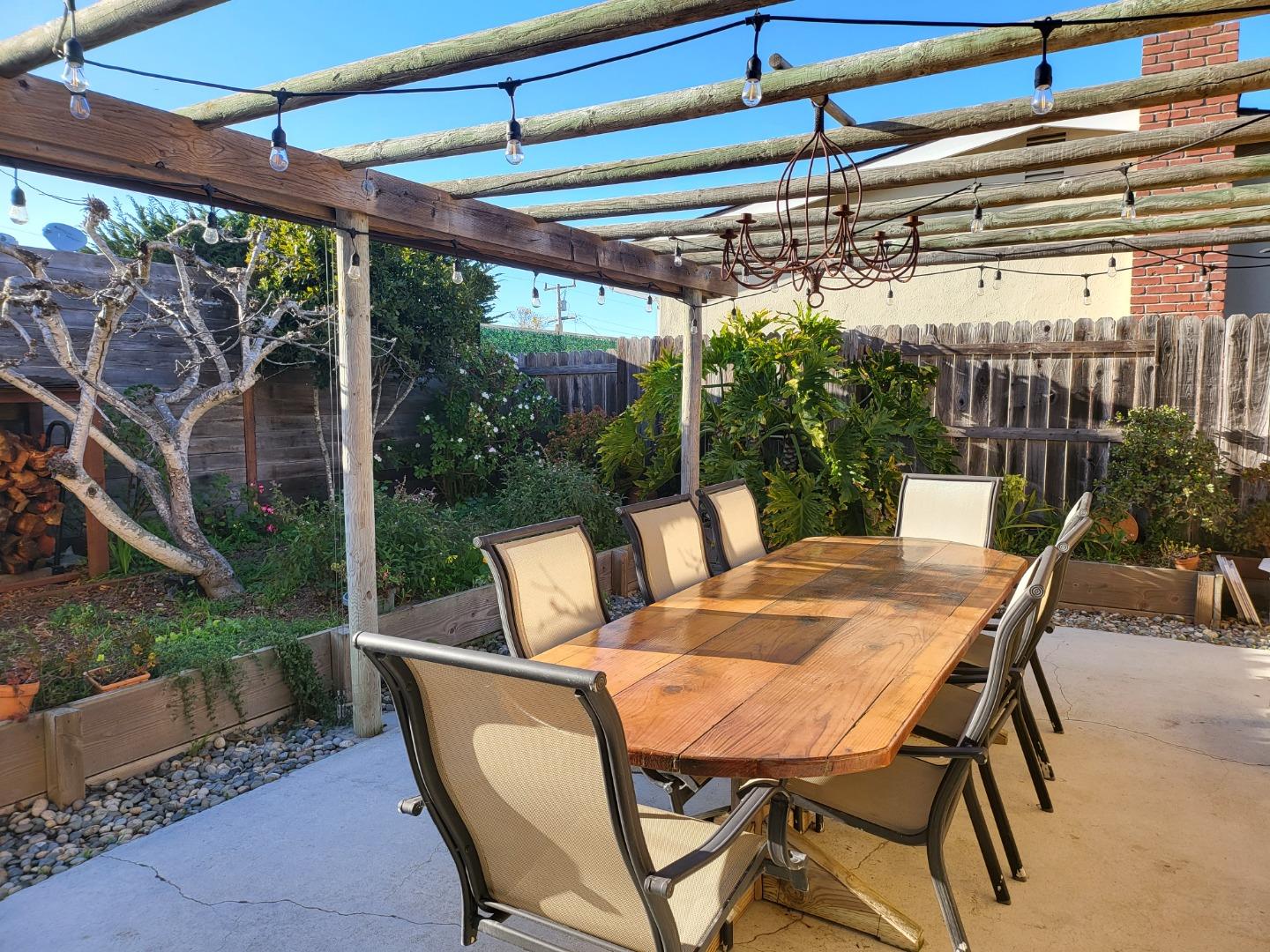 1753 Juarez Street Seaside, CA 93955 - Photo 23 of 52 a view of an outdoor space with a table and chairs