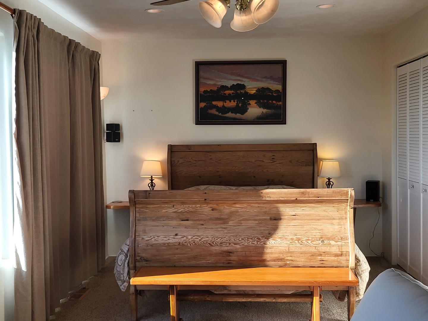 1753 Juarez Street Seaside, CA 93955 - Photo 34 of 52 a room with a bed and a painting on the wall