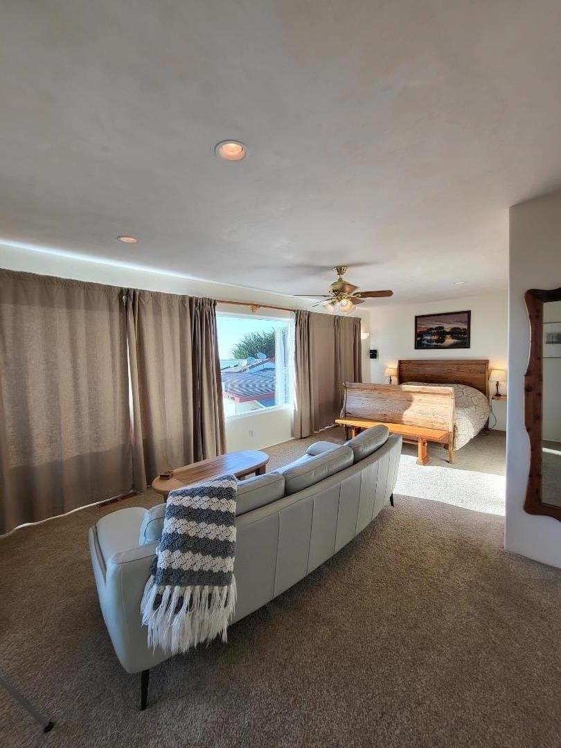 1753 Juarez Street Seaside, CA 93955 - Photo 40 of 52 a living room with furniture fireplace and a window