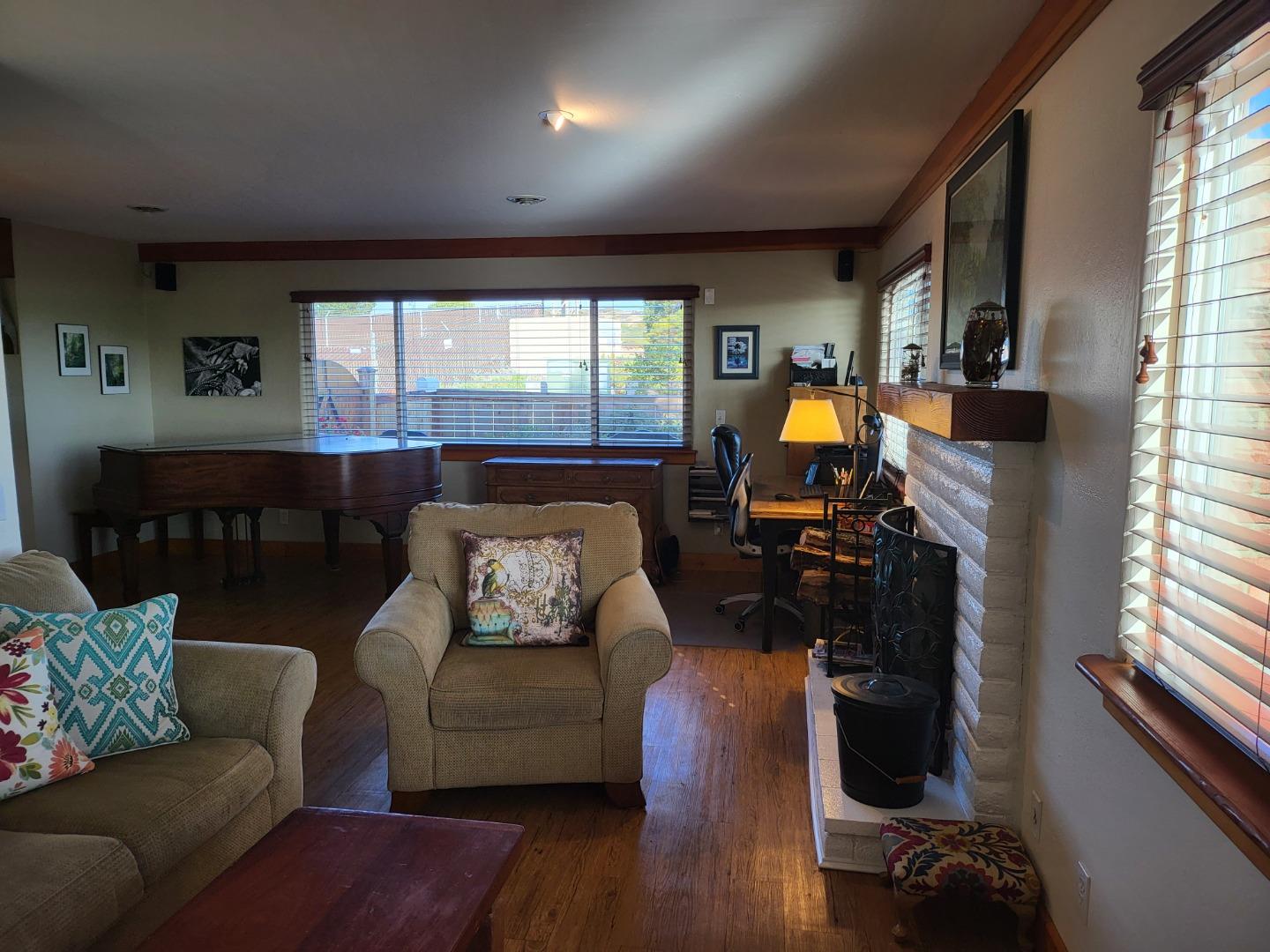 1753 Juarez Street Seaside, CA 93955 - Photo 46 of 52 a living room with furniture window and wooden floor