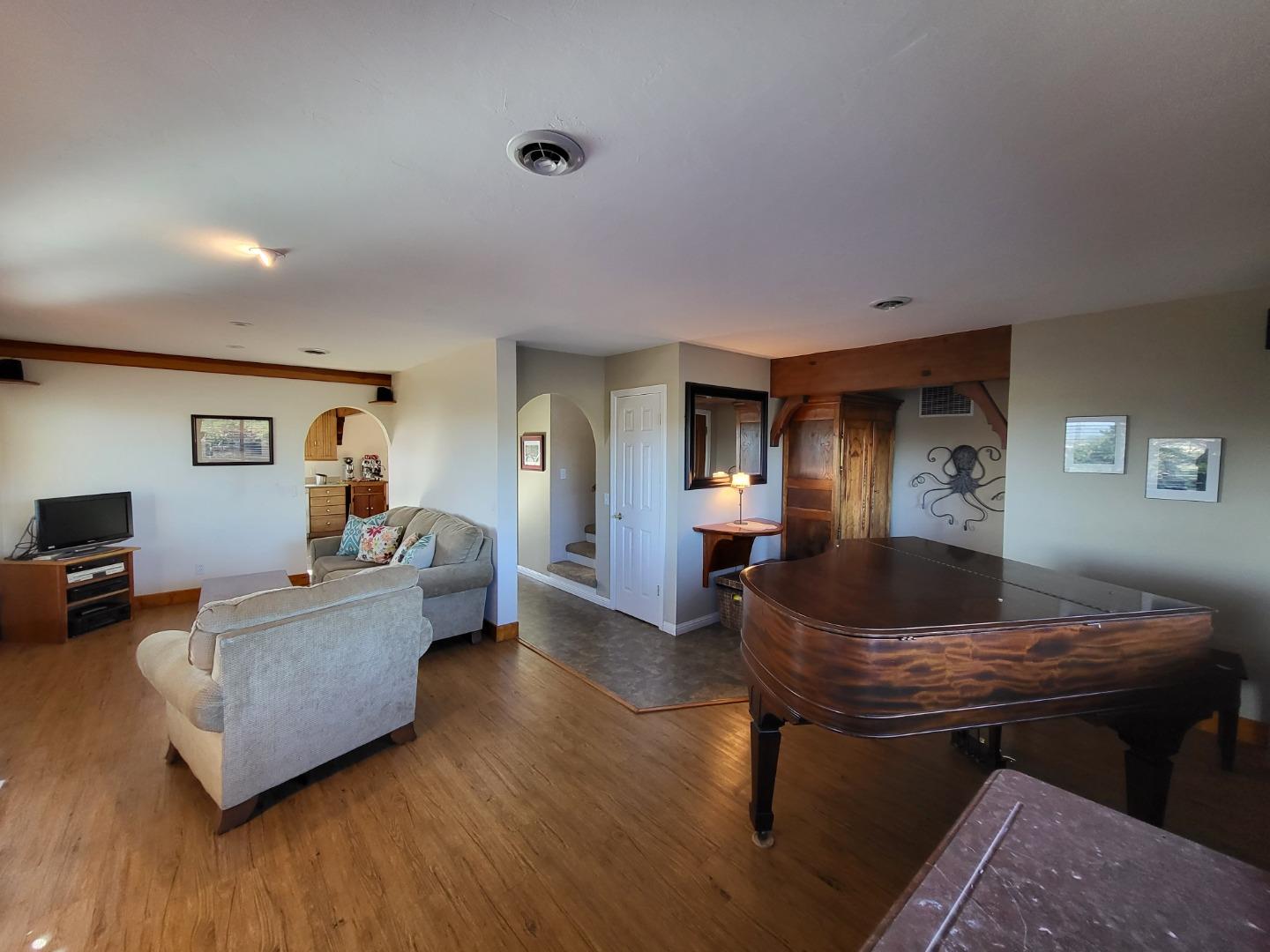 1753 Juarez Street Seaside, CA 93955 - Photo 10 of 52 a living room with furniture and a wooden floor