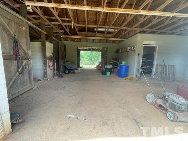 459 Cooke Road Louisburg, NC 27549 - Photo 12 of 14 Barn has 2 stalls 10x11, tack room, and contains plenty of space if you wanted to add additional stalls.