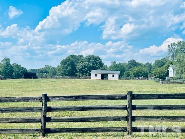 459 Cooke Road Louisburg, NC 27549 - Photo 7 of 14 Front pasture with barn.