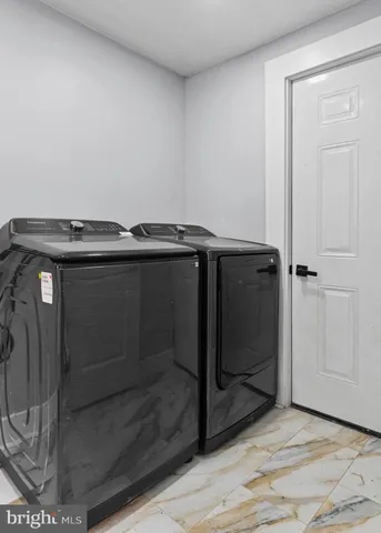 a utility room with closet