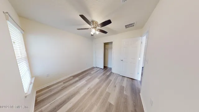a bathroom with a sink and a shower