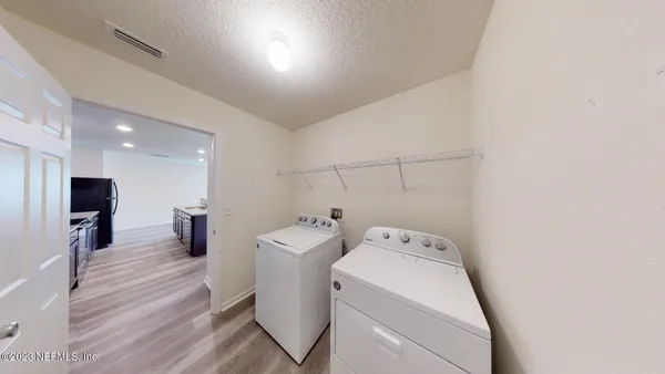 a view of a city with lawn chairs