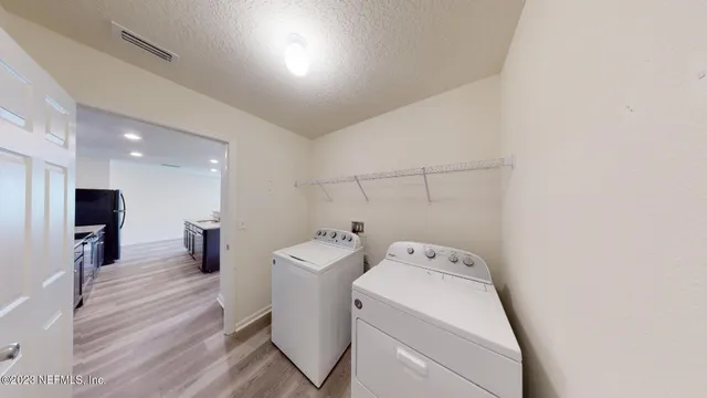 a view of a city with lawn chairs