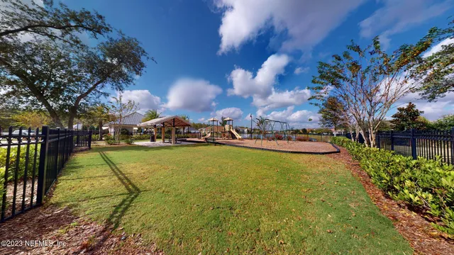 a view of a house with basketball court