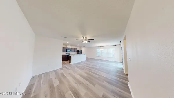 a view of entryway with wooden floor