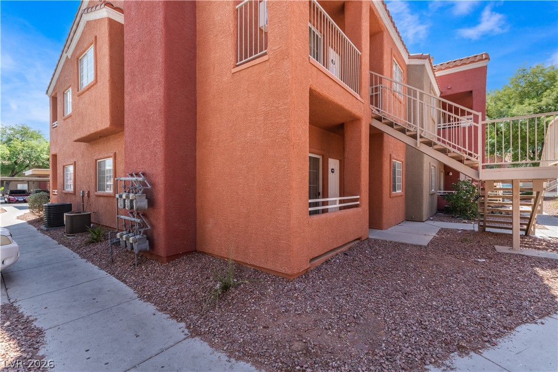 4730 East Craig Road, Unit 1058 Las Vegas, NV 89115 - Photo 2 of 30 Multi-level living with individual balconies and exterior stair access.