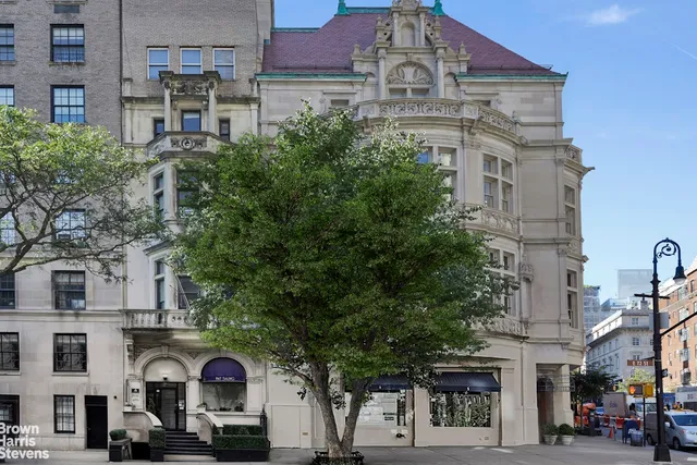 a front view of a building with street view