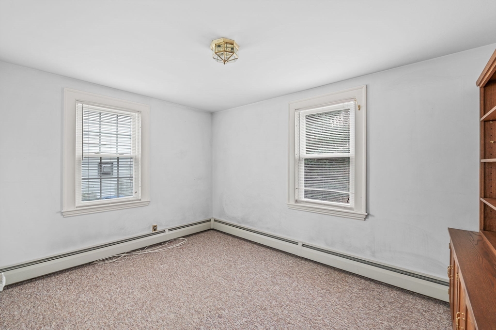 5 Prospect Street Danvers, MA 01923 - Photo 18 of 42 an empty room with a window