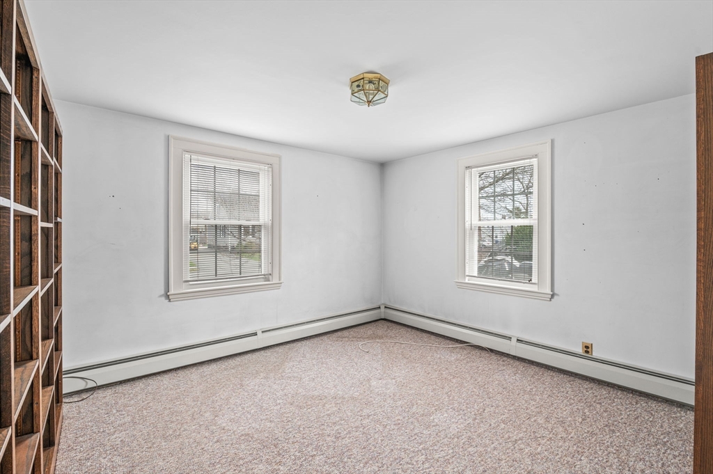 5 Prospect Street Danvers, MA 01923 - Photo 20 of 42 an empty room with windows