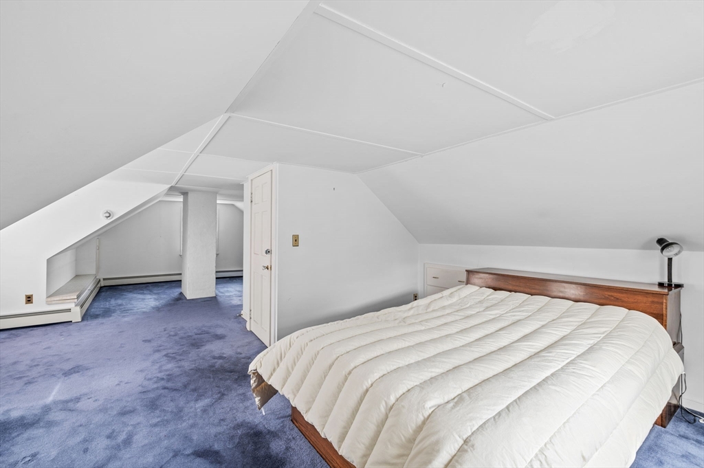 5 Prospect Street Danvers, MA 01923 - Photo 26 of 42 a bedroom with a bed and a view of room