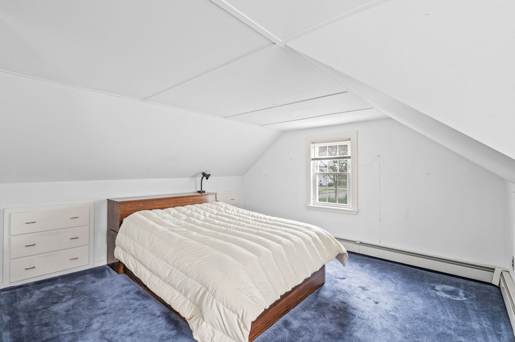 5 Prospect Street Danvers, MA 01923 - Photo 27 of 42 a bedroom with a bed and closet