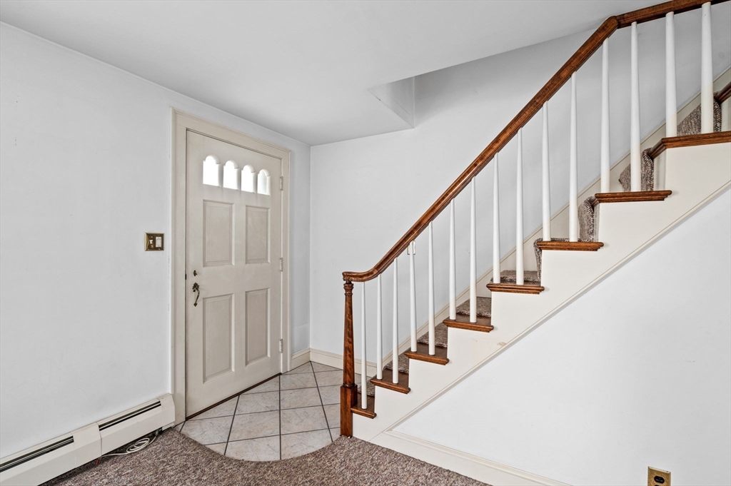 5 Prospect Street Danvers, MA 01923 - Photo 3 of 42 a view of entryway with wooden floor and stairs