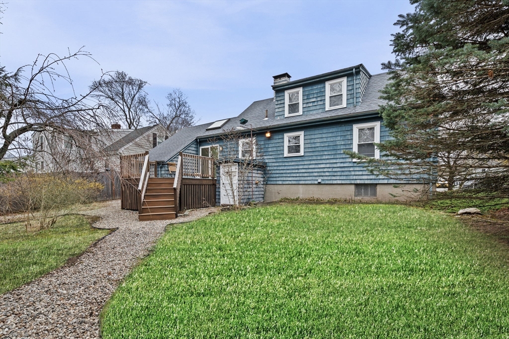 5 Prospect Street Danvers, MA 01923 - Photo 37 of 42 a front view of a house with a yard