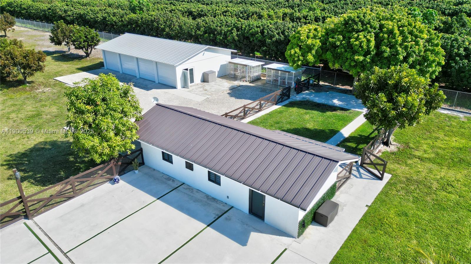 20407 Southwest 226th Street Miami, FL 33170 - Photo 14 of 71 a view of a patio with chairs