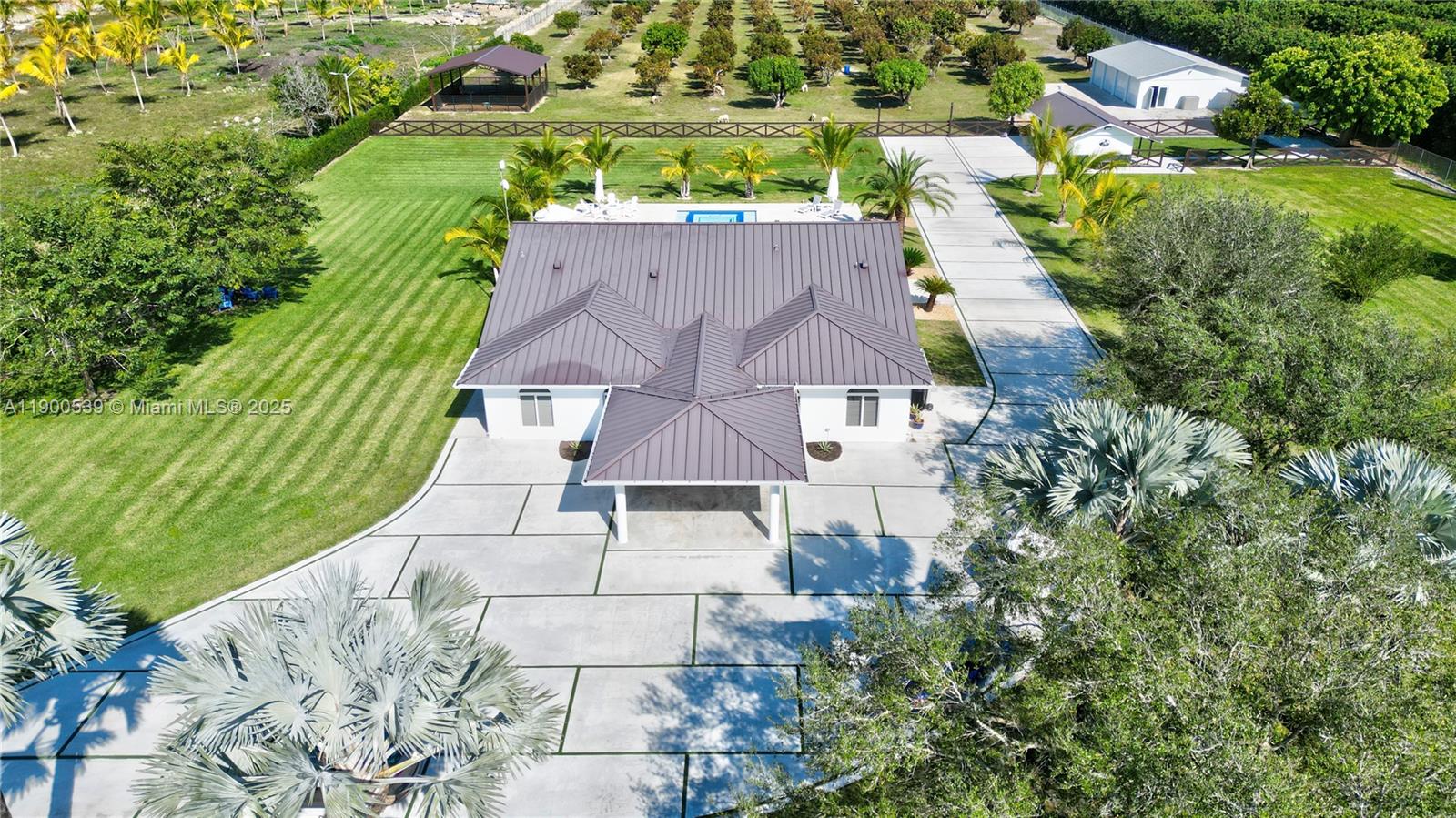 20407 Southwest 226th Street Miami, FL 33170 - Photo 17 of 71 an aerial view of house with yard