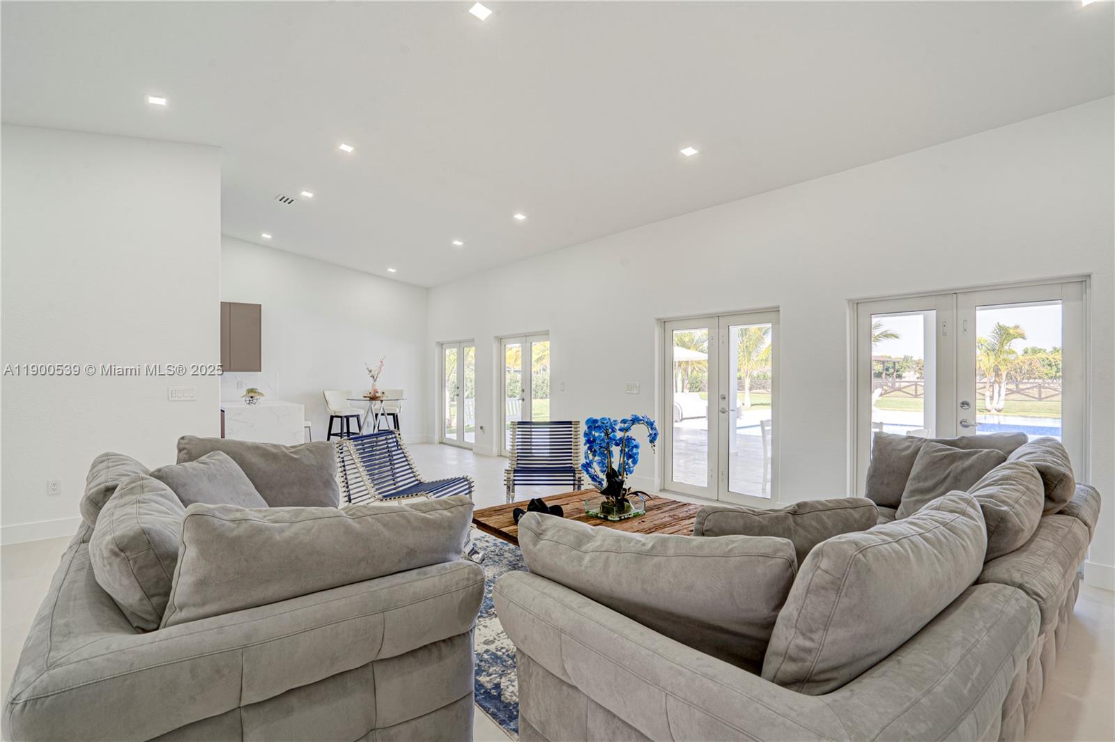 20407 Southwest 226th Street Miami, FL 33170 - Photo 20 of 71 a living room with furniture and a large window
