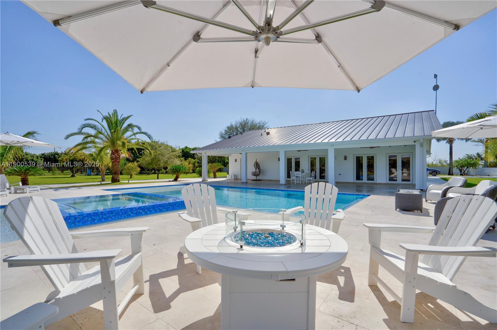 20407 Southwest 226th Street Miami, FL 33170 - Photo 2 of 71 a view of a dining room with furniture window and outside view