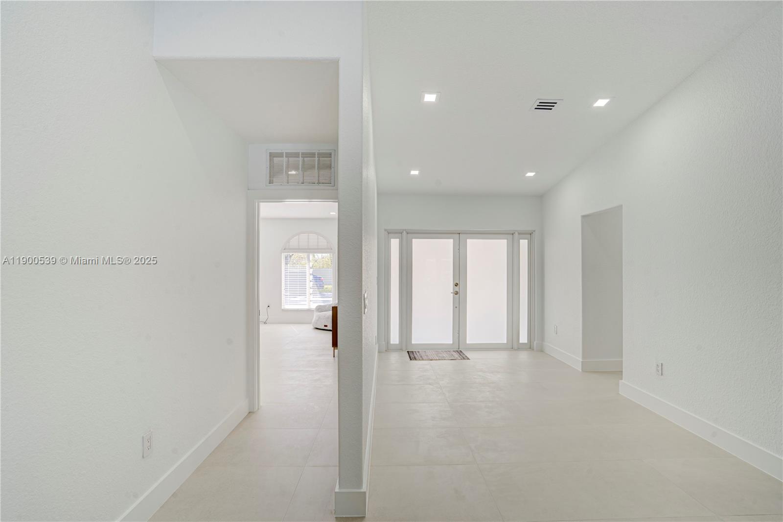 20407 Southwest 226th Street Miami, FL 33170 - Photo 31 of 71 a view of an empty room with a window
