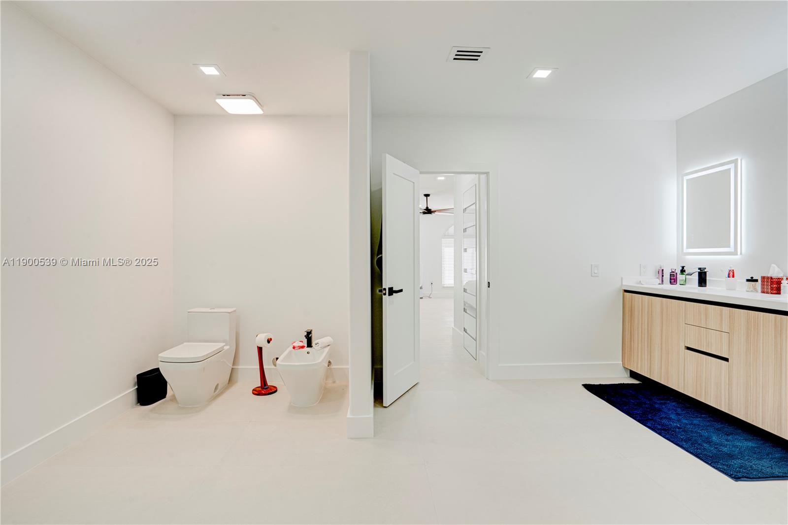 20407 Southwest 226th Street Miami, FL 33170 - Photo 45 of 71 a bathroom with a sink and a mirror