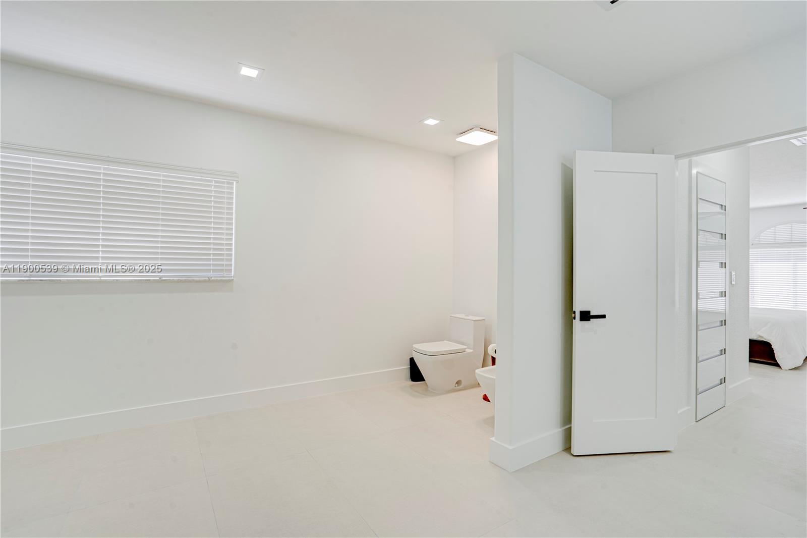 20407 Southwest 226th Street Miami, FL 33170 - Photo 46 of 71 a view of room with baby crib