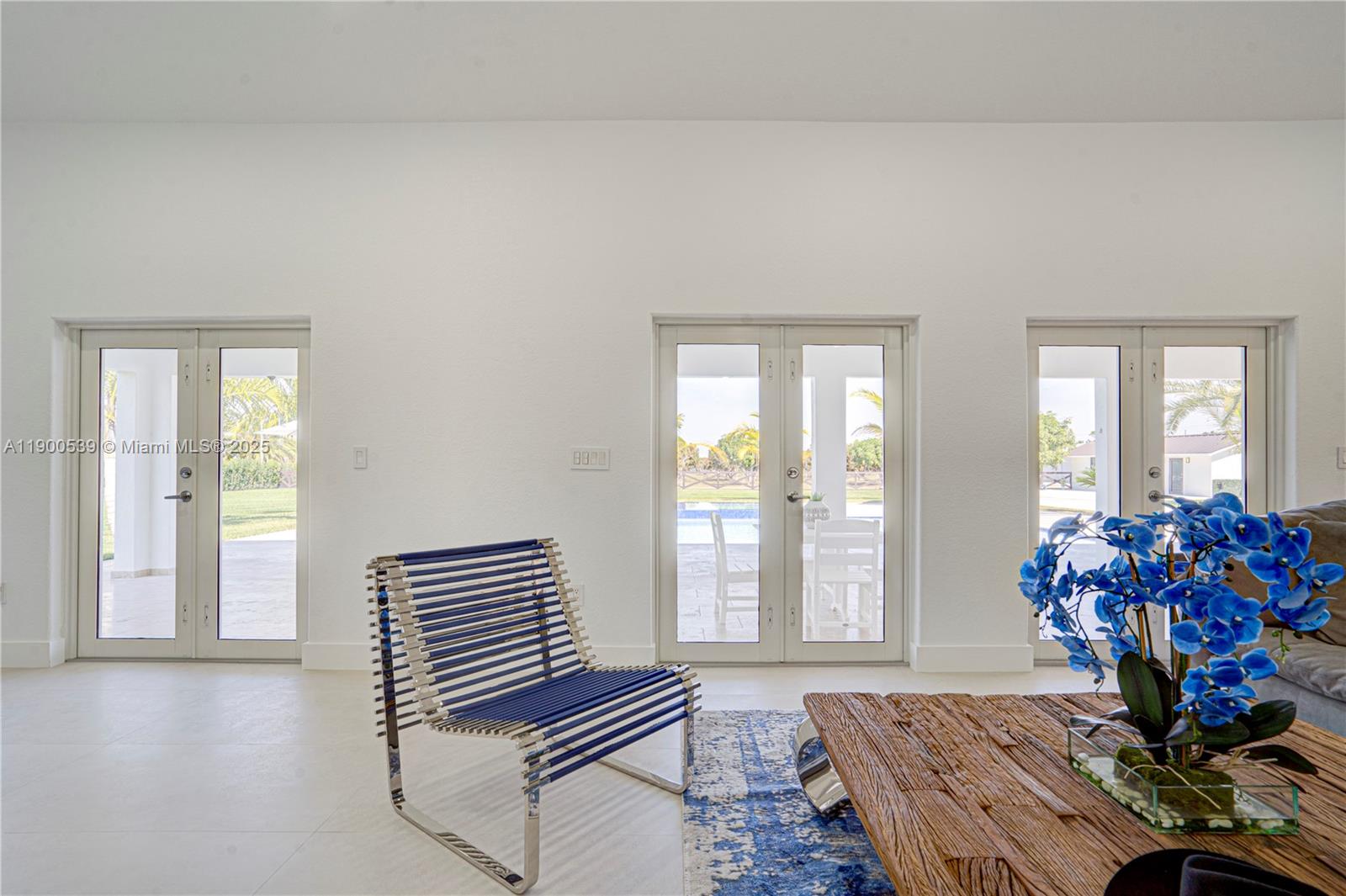 20407 Southwest 226th Street Miami, FL 33170 - Photo 61 of 71 a living room with furniture and wooden floor