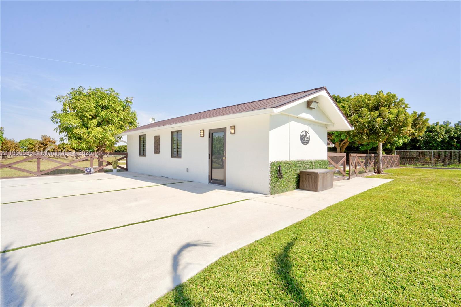 20407 Southwest 226th Street Miami, FL 33170 - Photo 62 of 71 a view of a house with a swimming pool