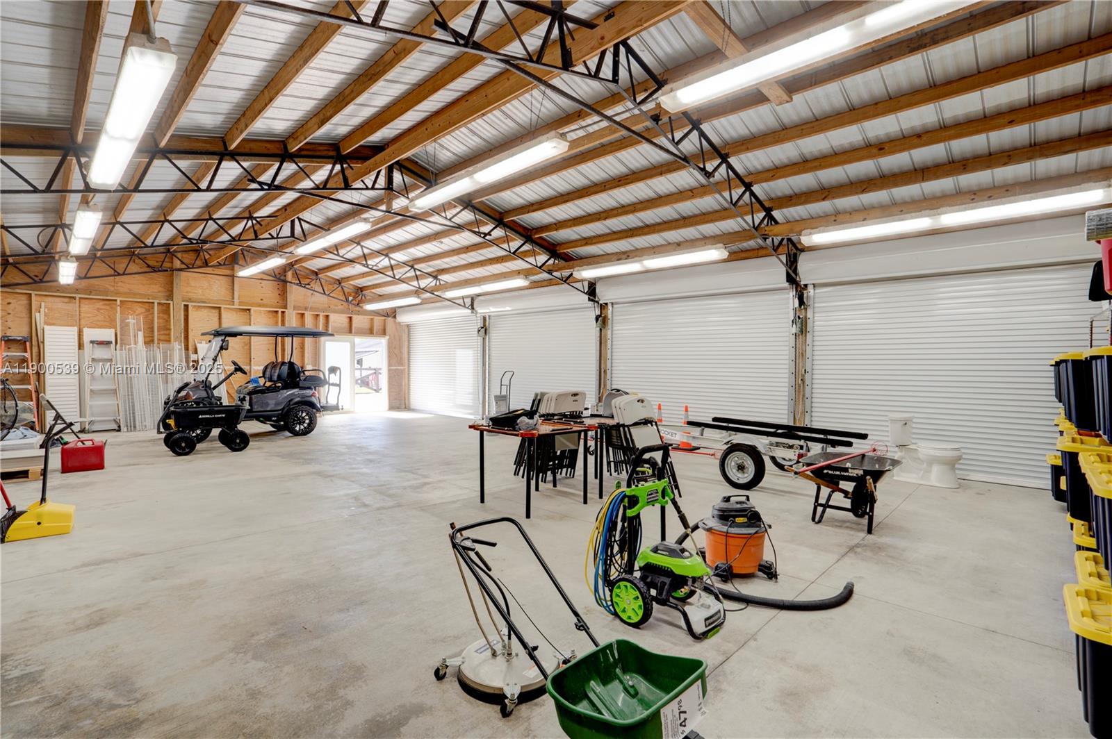 20407 Southwest 226th Street Miami, FL 33170 - Photo 70 of 71 a view of a room with gym equipment