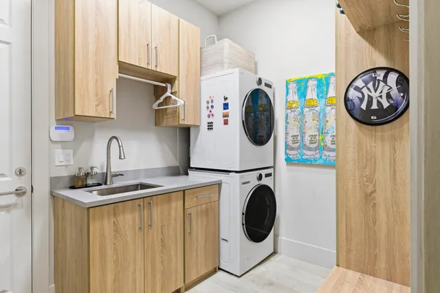 a utility room with dryer and washer