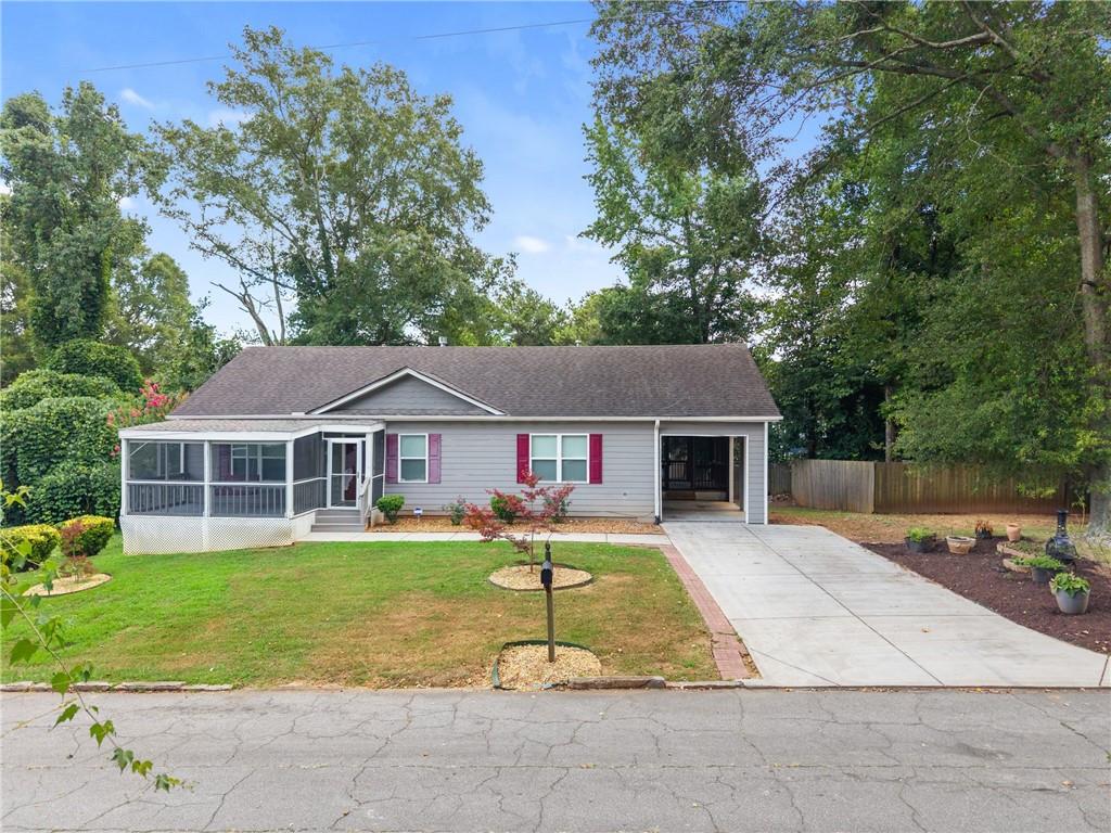 3159 Robinson Avenue Scottdale, GA 30079 - Photo 1 of 45 front view of a house with yard