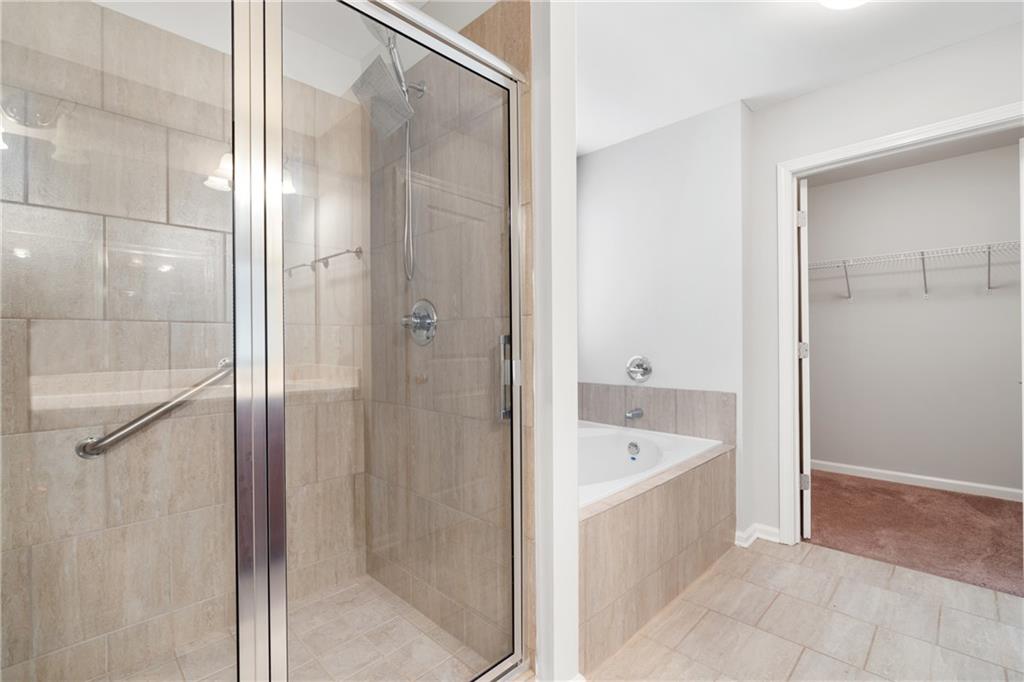 3159 Robinson Avenue Scottdale, GA 30079 - Photo 22 of 45 a bathroom with a tub shower and sink