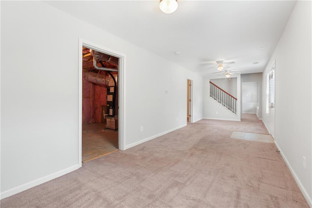 3159 Robinson Avenue Scottdale, GA 30079 - Photo 34 of 45 an empty room with closet and a hallway