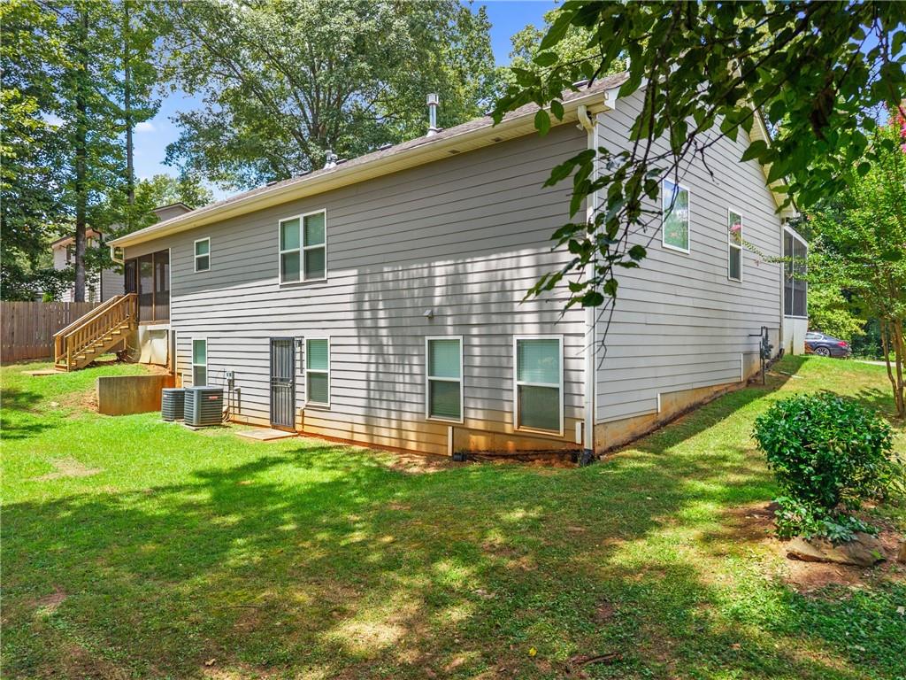 3159 Robinson Avenue Scottdale, GA 30079 - Photo 42 of 45 a front view of a house with yard and green space