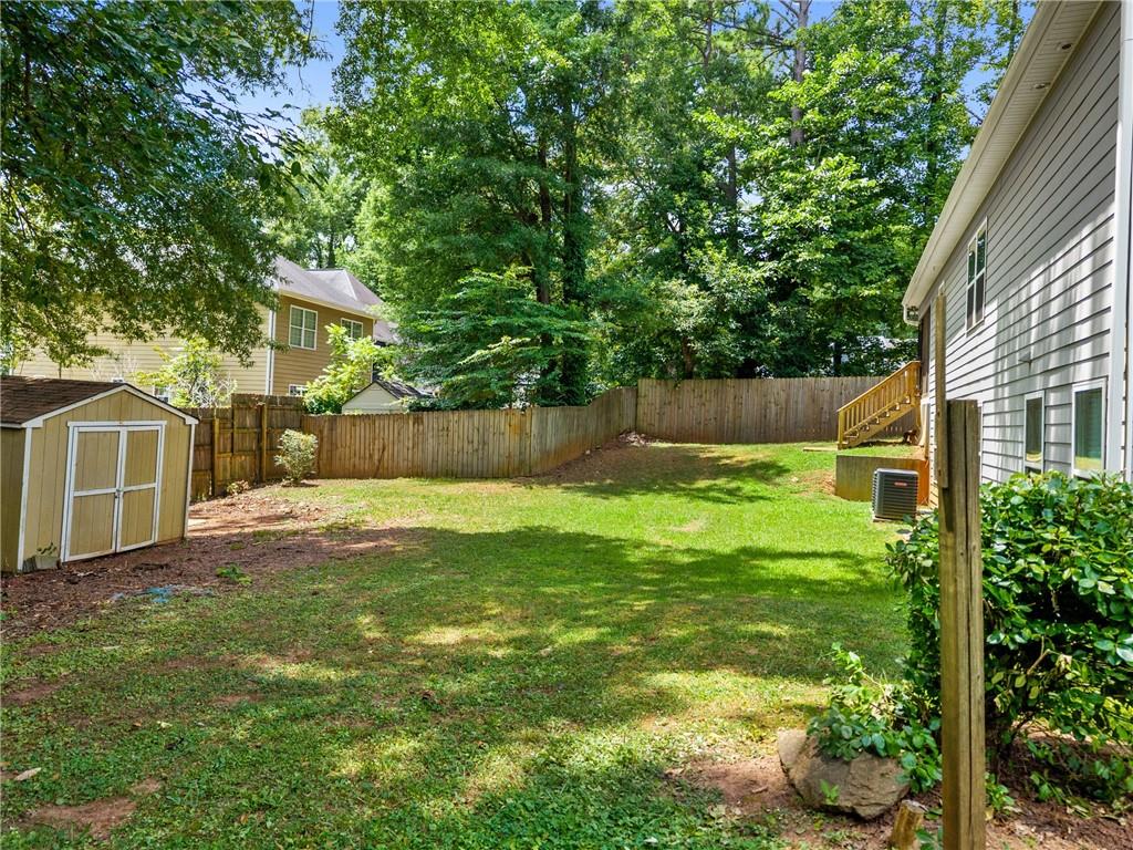 3159 Robinson Avenue Scottdale, GA 30079 - Photo 43 of 45 a view of a backyard with a tree