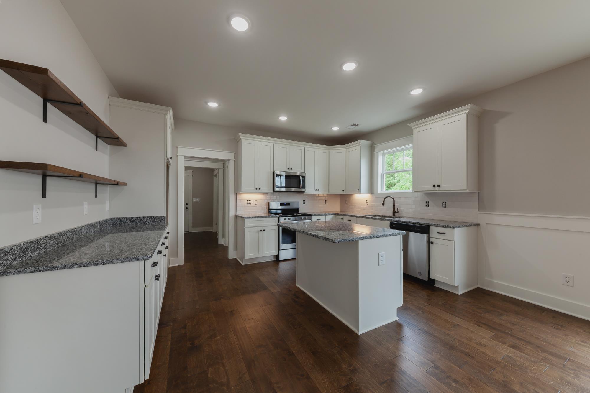 409 Harding Drive Lebanon, TN 37087 - Photo 6 of 17 Open Kitchen with Granite Countertops, Stainless Appliances and Gas Stove