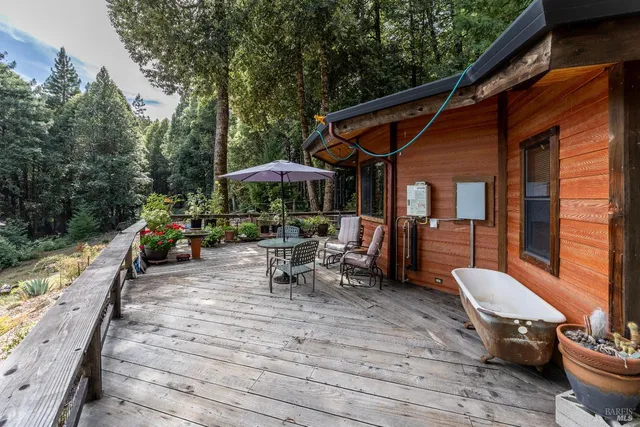 a view of outdoor space yard deck patio and outdoor kitchen