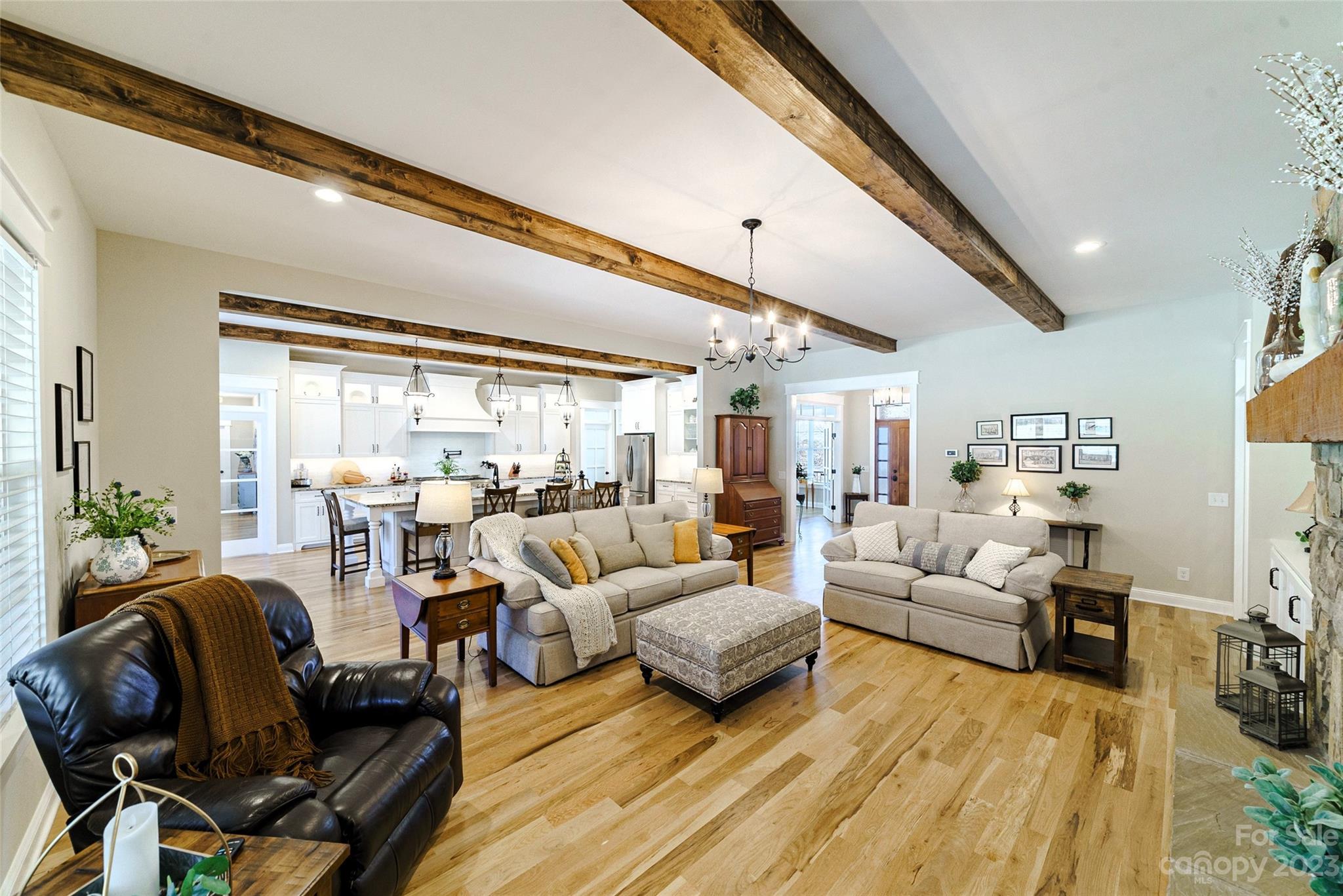 16063 McLester Road Oakboro, NC 28129 - Photo 11 of 48 a living room with furniture and a large window