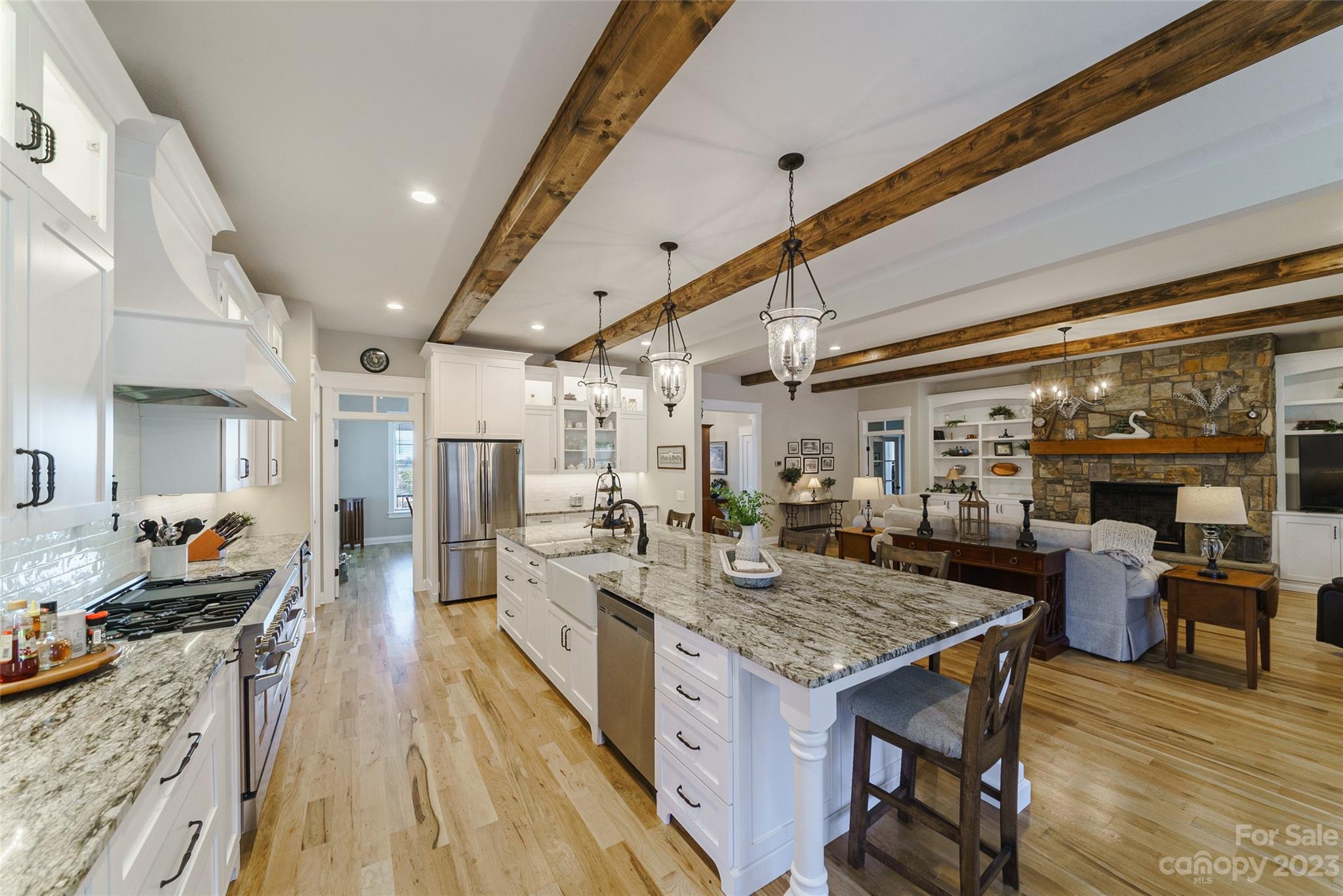 16063 McLester Road Oakboro, NC 28129 - Photo 12 of 48 a large kitchen with a table and chairs